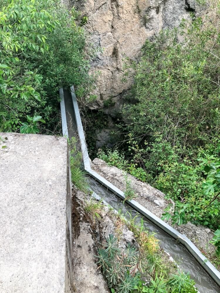 irrigation tunnel on trail alongside of hiking trail