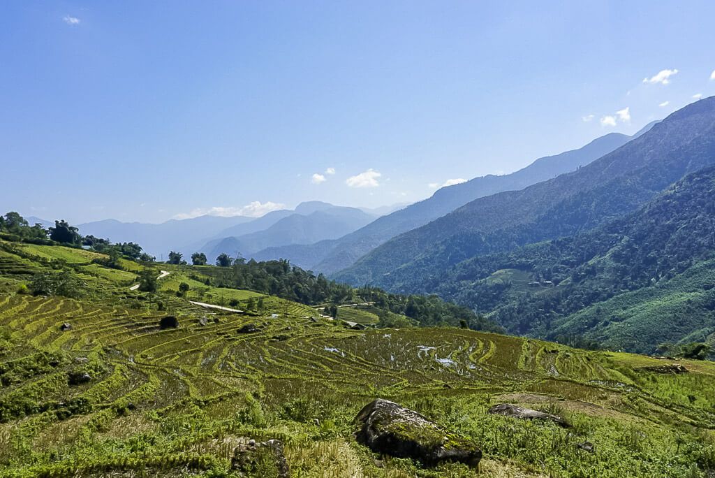 Beautiful rolling hills in Sapa littered with waterlogged rice paddies