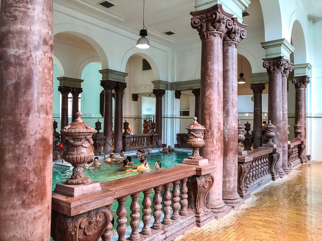 heated indoor pool szechenyi baths with roman columns