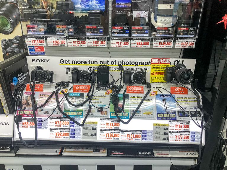 A large display of cameras in a store in Tokyo