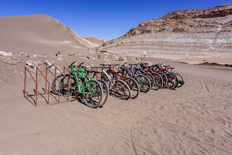 rack full of mountain bikes in valle de la luna