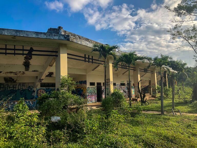 Exterior of abandoned water park amphitheater hue