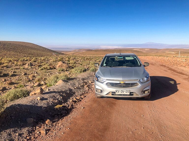 hire car on dirt road with open views on itinerary for San Pedro de atacama