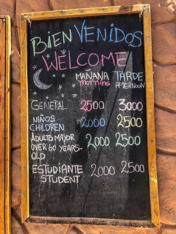 sign of all prices for entrance to valle de la luna by mountain bike
