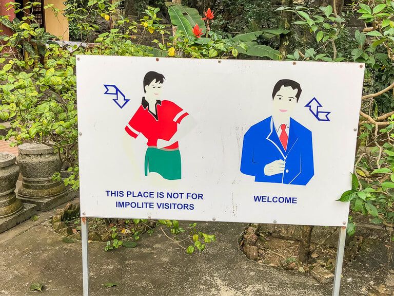 Sign showing impolite visitors to Bich Dong pagoda are not welcome