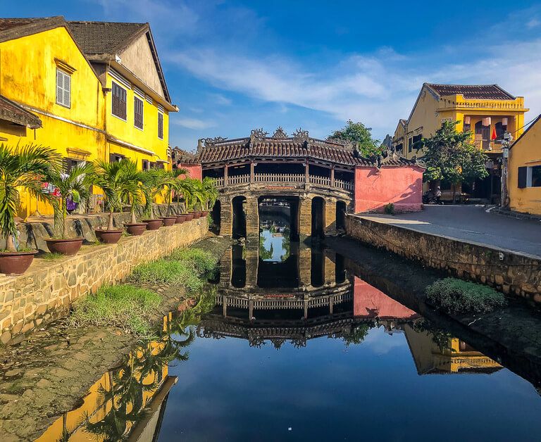 Hoi An Japanese bridge reflecting in canal stunning colors
