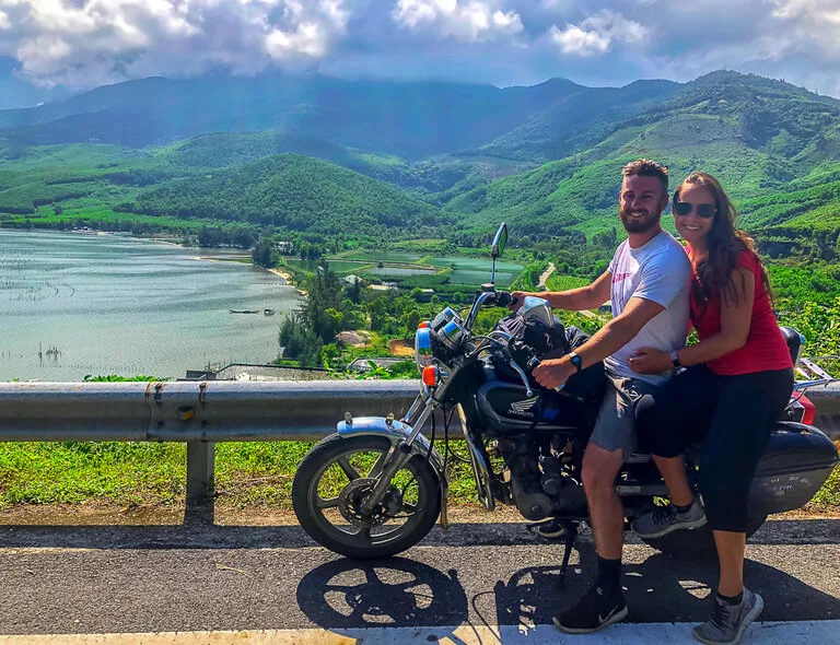 Mark and kristen on a motorbike crossing Hai Van pass near da nang on way to Hoi An