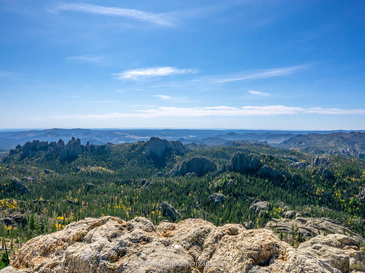 Stunning view over South Dakota from the summit of Black Elk Peak one of the best stops to make a on a road trip through the Black Hills