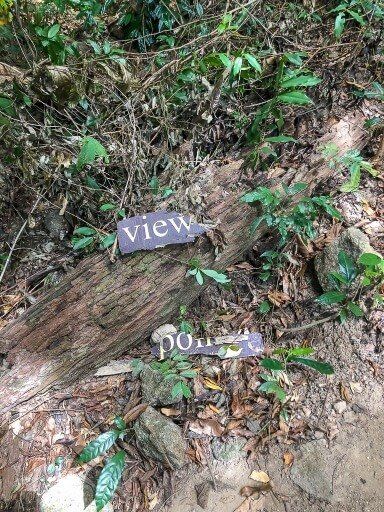 Viewpoint sign broken in half on Koh Adang hike