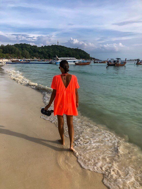 Kristen walking along the shores of the Andaman sea and Pattaya Beach in Koh Lipe Thailand