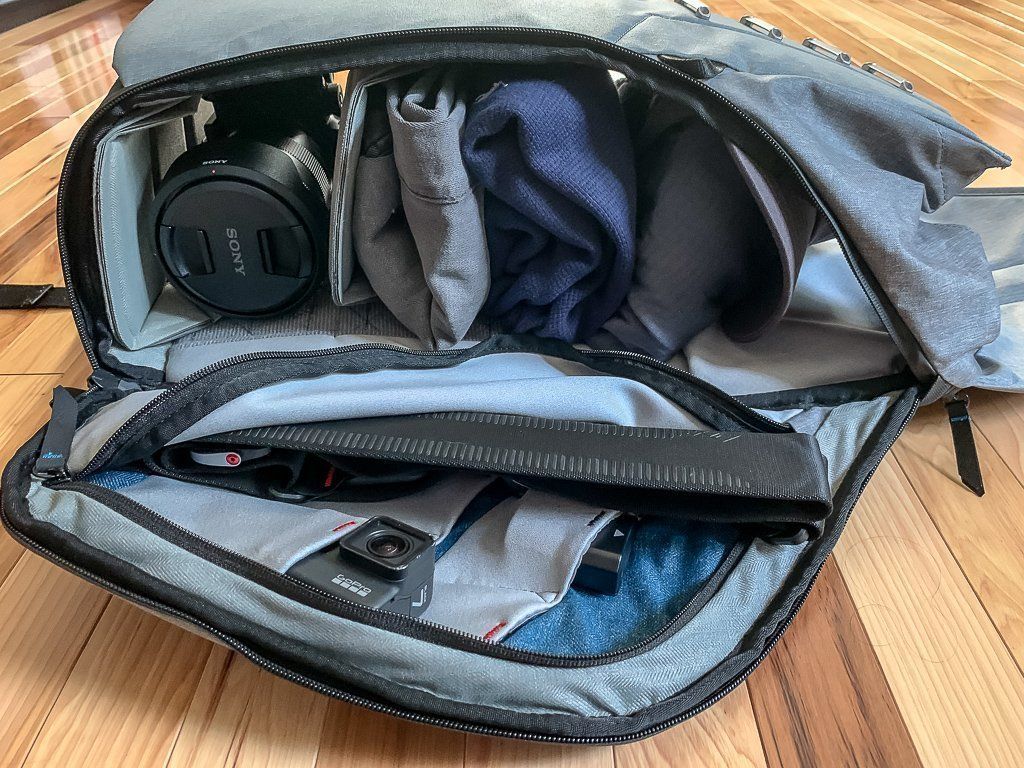 Clothes and camera inside travel carry on bag