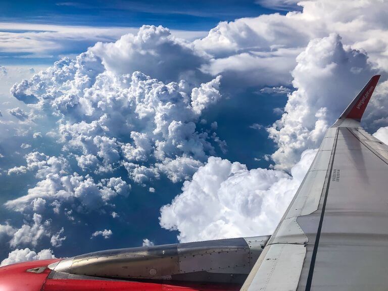 Airplane in dense clouds in Asia