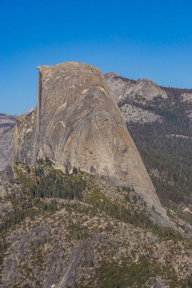 Half Dome at Yosemite national park california - view from the side shows the severity of its steep edges and grandeur