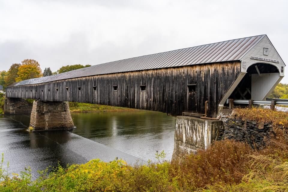 Stunning long wooden covered bridge between Vermont and New Hampshire near Woostock