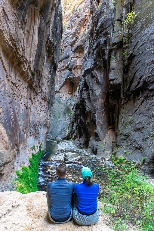 Mark and Kristen where are those morgans sitting on a ledge overlooking zion national park the narrows river slot canyon trail on a bottom up day hike