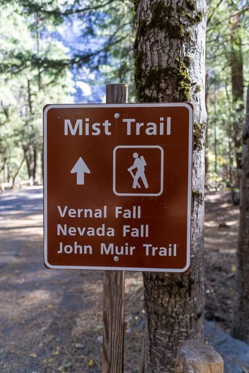 Yosemite Mist Trail sign showing vernal fall nevada fall and john muir trail hike