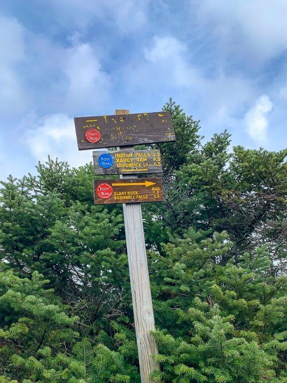 Sign showing the route to Mount Marcy summit in adirondacks