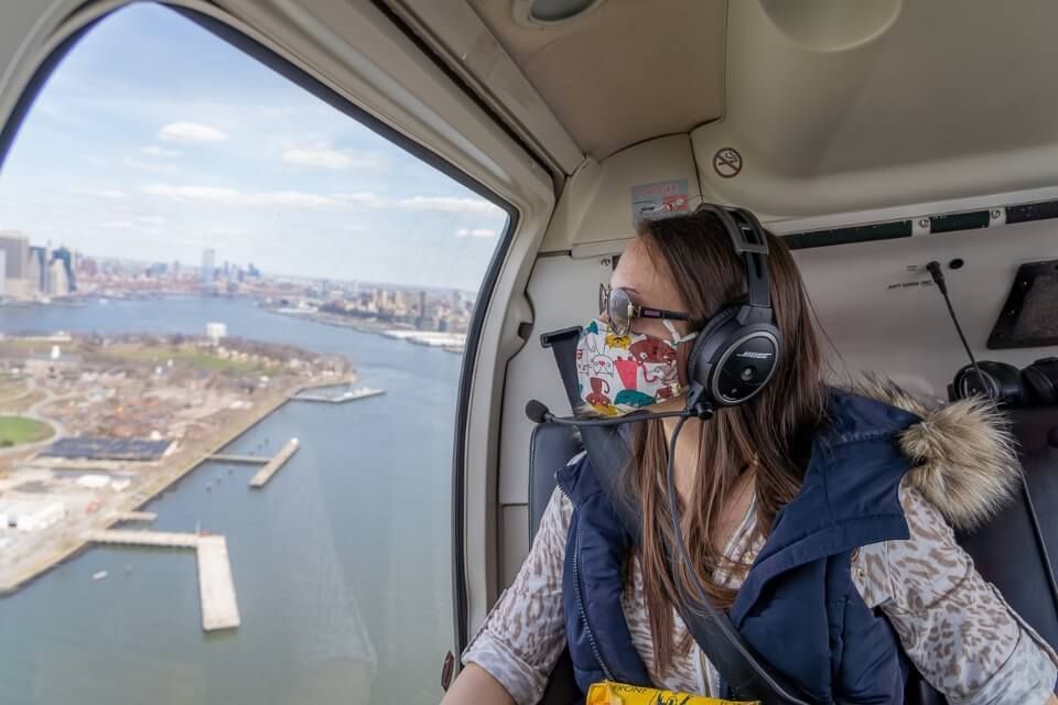 woman in helicopter over new york city
