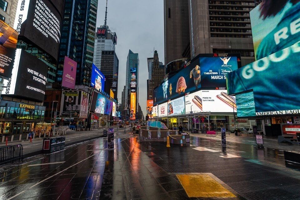 NYC times square before sunrise bright lights and no people around completely empty