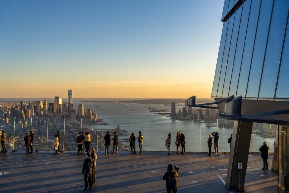 New York City observation deck at sunset featuring Lower Manhattan views