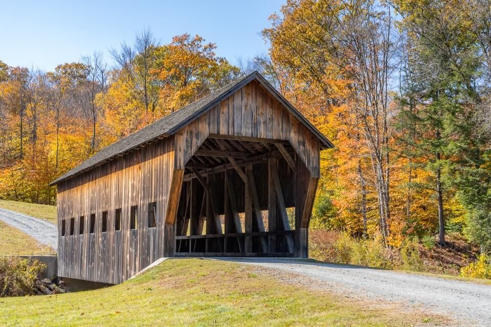 Mill Brook covered bridge Hammondsville Woodstock Vermont stunning bridge backed by fall foliage colors