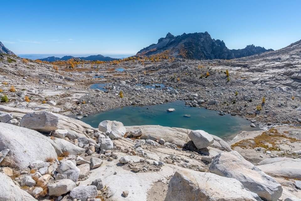 Granite rocks blue lakes and golden larches upper enchantments day hike perfect weather