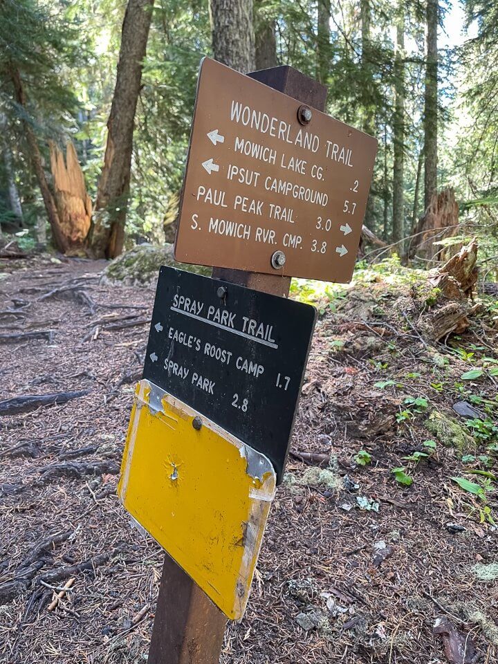 Sign posts with distances on a hike in washington