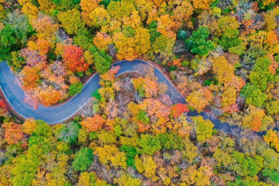 Stowe Vermont in fall new england road trip stunning colors and winding road