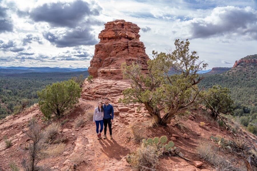 Couple standing at the Boynton Canyon vortex site in Sedona Arizona