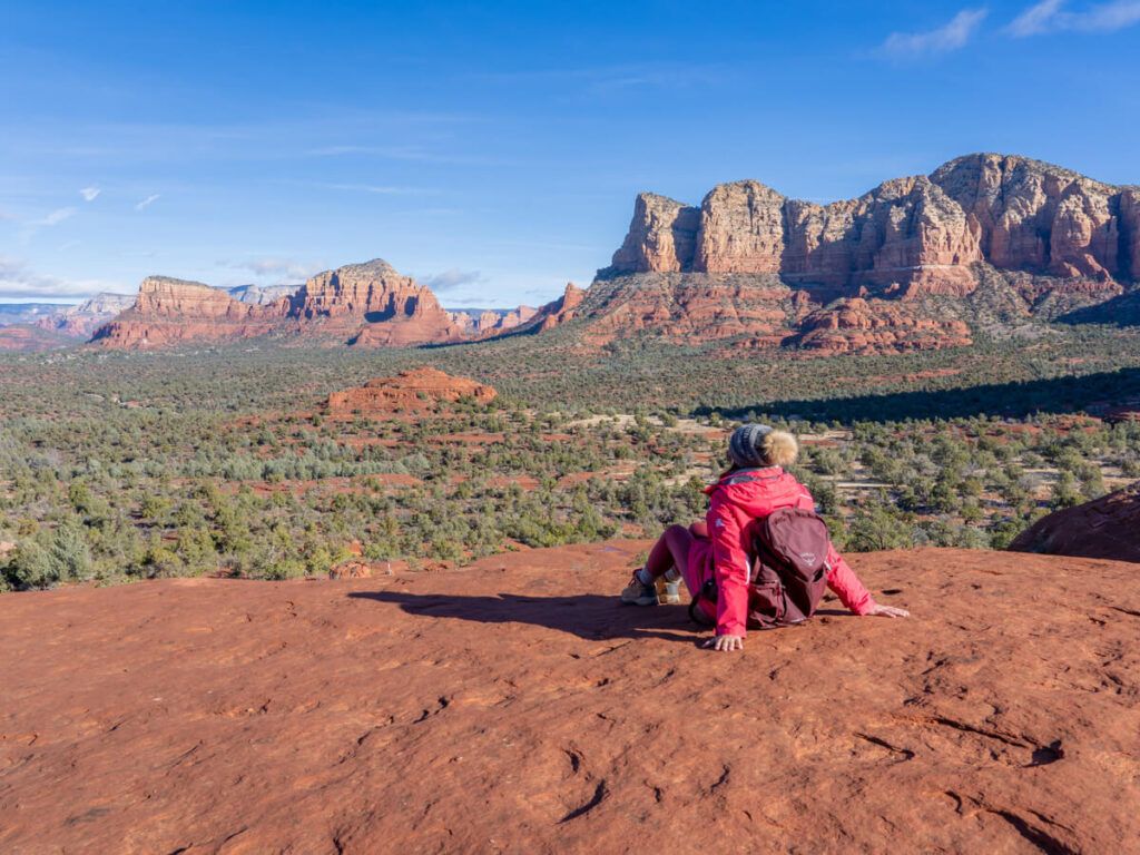 Hiker sat on Bell Rock soaking up the view