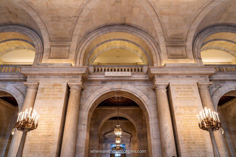 A large stone hallway inside the New York Public Library