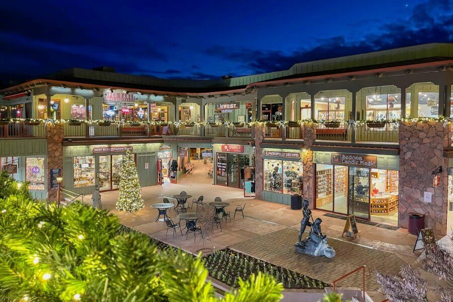 Shops and hotels in Uptown Sedona in northern Arizona at night with christmas decorations