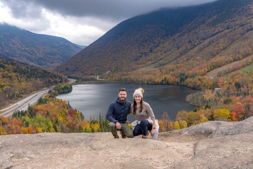 Man and woman posing for a photo on Artists Bluff in New Hampshire
