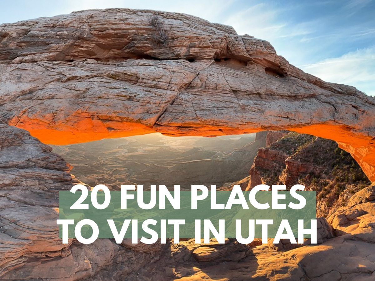 Photo of a sandstone arch glowing orange underneath with distant views over a rocky landscape and the words 20 fun places to visit in Utah overlaid