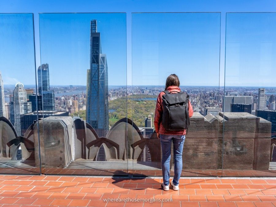Woman enjoying the view of Central Park from a NYC observation deck
