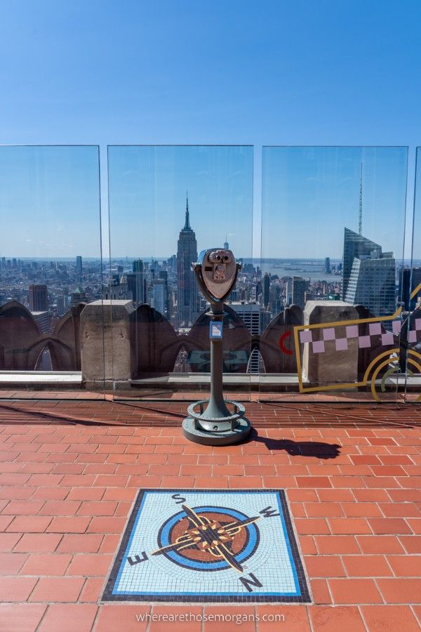 Compass, viewfinder and Empire State Building view