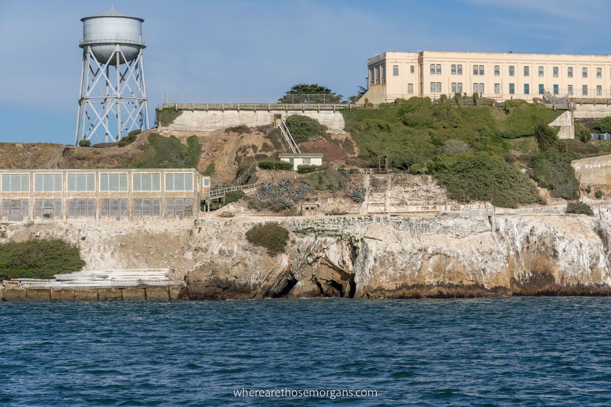 Back side view of Alcatraz Island with a small sea cave underneath