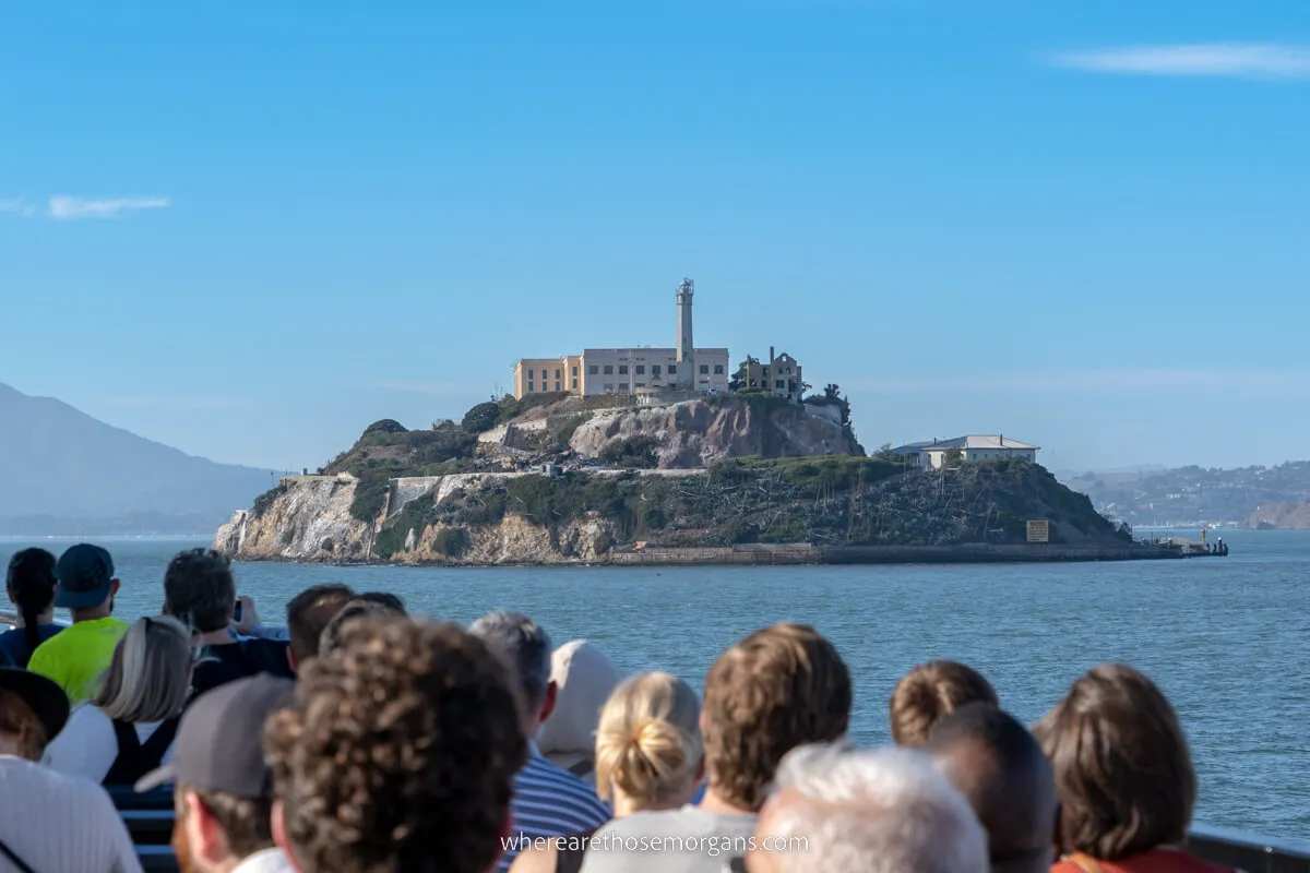 Group of visitors on on the Alcatraz cruise during a night tour of the island