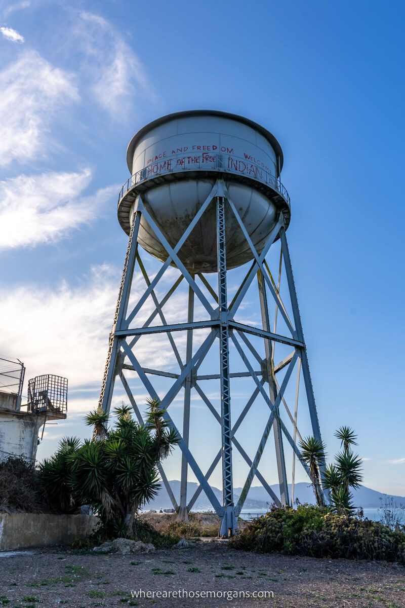 Old water tower on Alcatraz Island with graffiti from Indigenous occupation