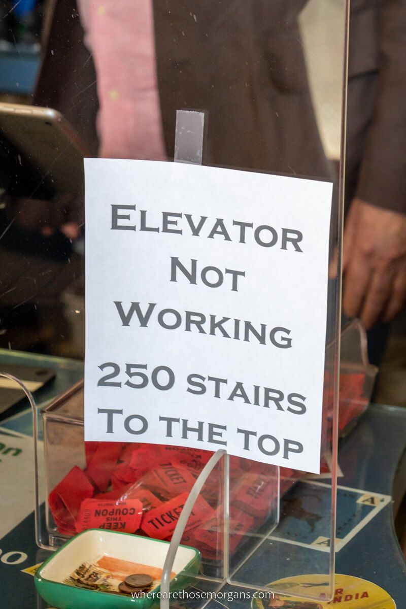 Elevator not working sign with 250 steps to the top
