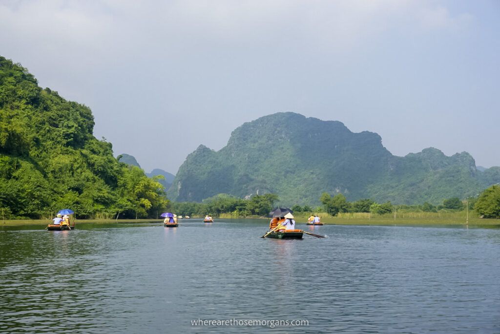 Many visitors experiencing the Trang An boat tour in Ninh Binh, Vietnam