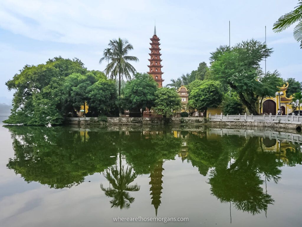 Reflection of a bridge and temple in Hanoi, Vietnam