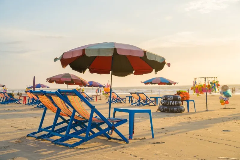 Chairs and tables set up along a section of beach in Vung Tau