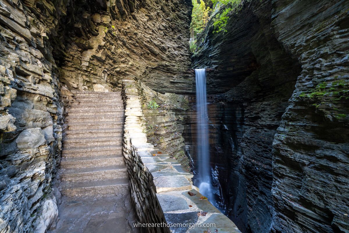 A stone staircase leading to Cascade Cavern at Watkins Glen State Park, home to some of the best New York Finger Lake waterfalls