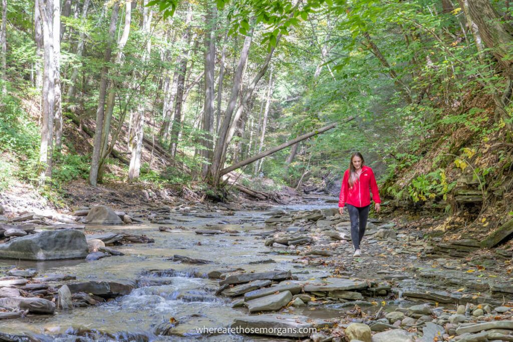Woman walking along the Grimes Creek bed in upstate New York