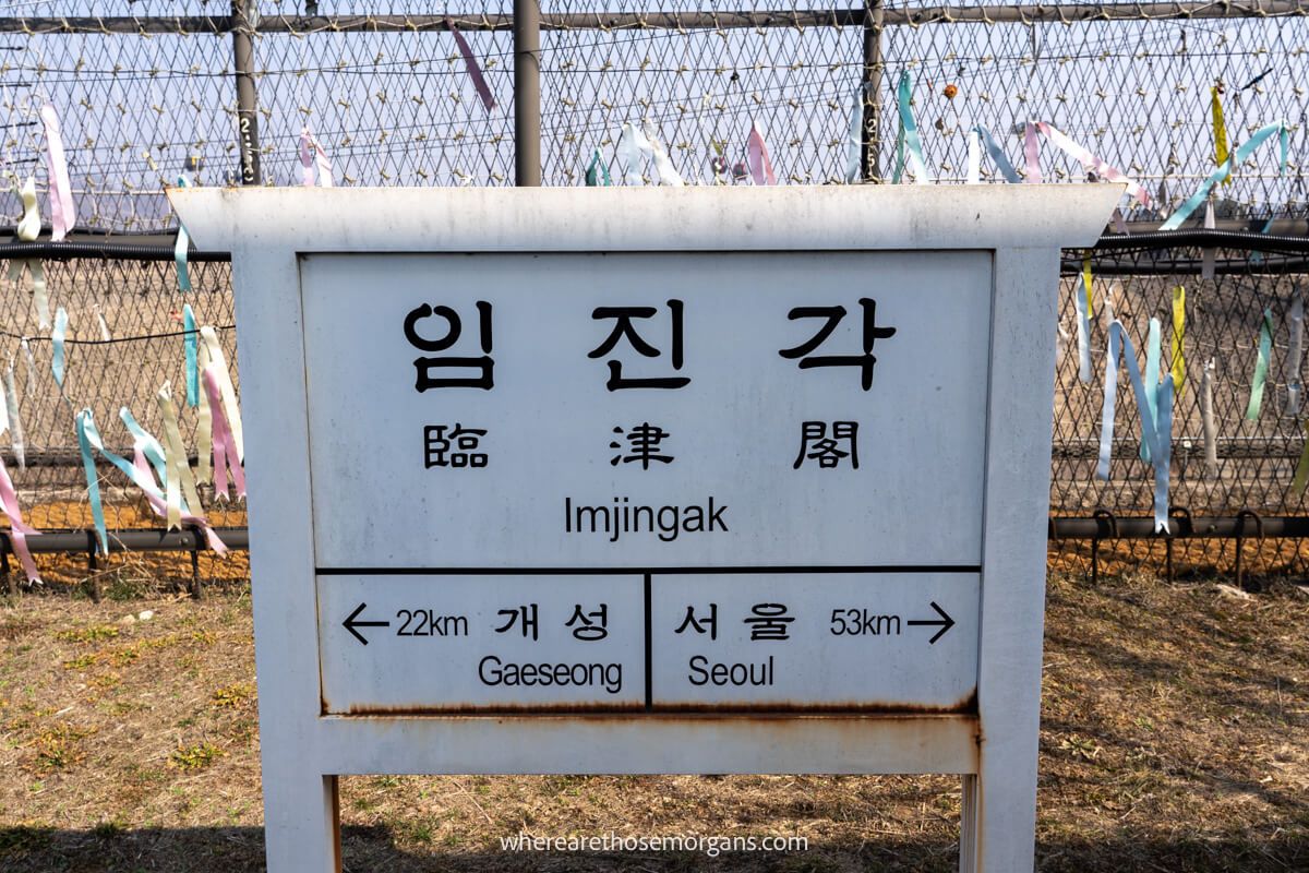 White Imjingak park sign showing distance to Seoul and Gaeseong