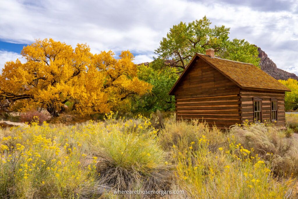 Exterior view of the Fruita schoolhouse with bright fall foliage