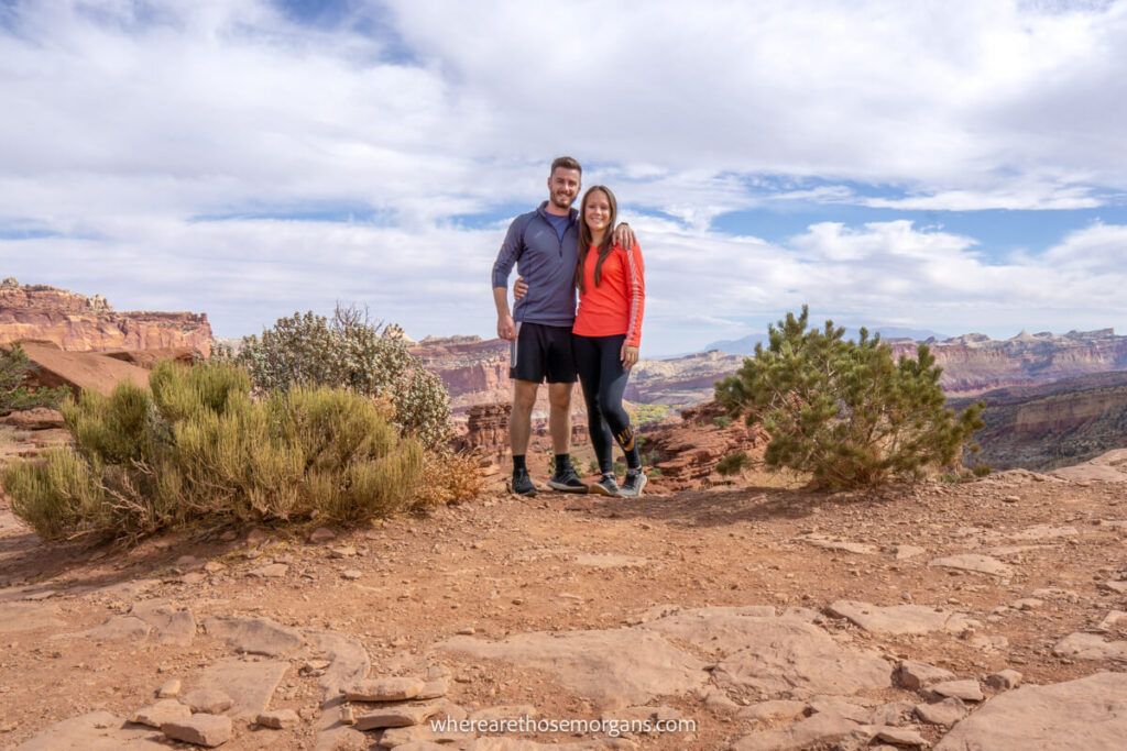 Two hikers posing for a photograph in Capitol Reef National Park
