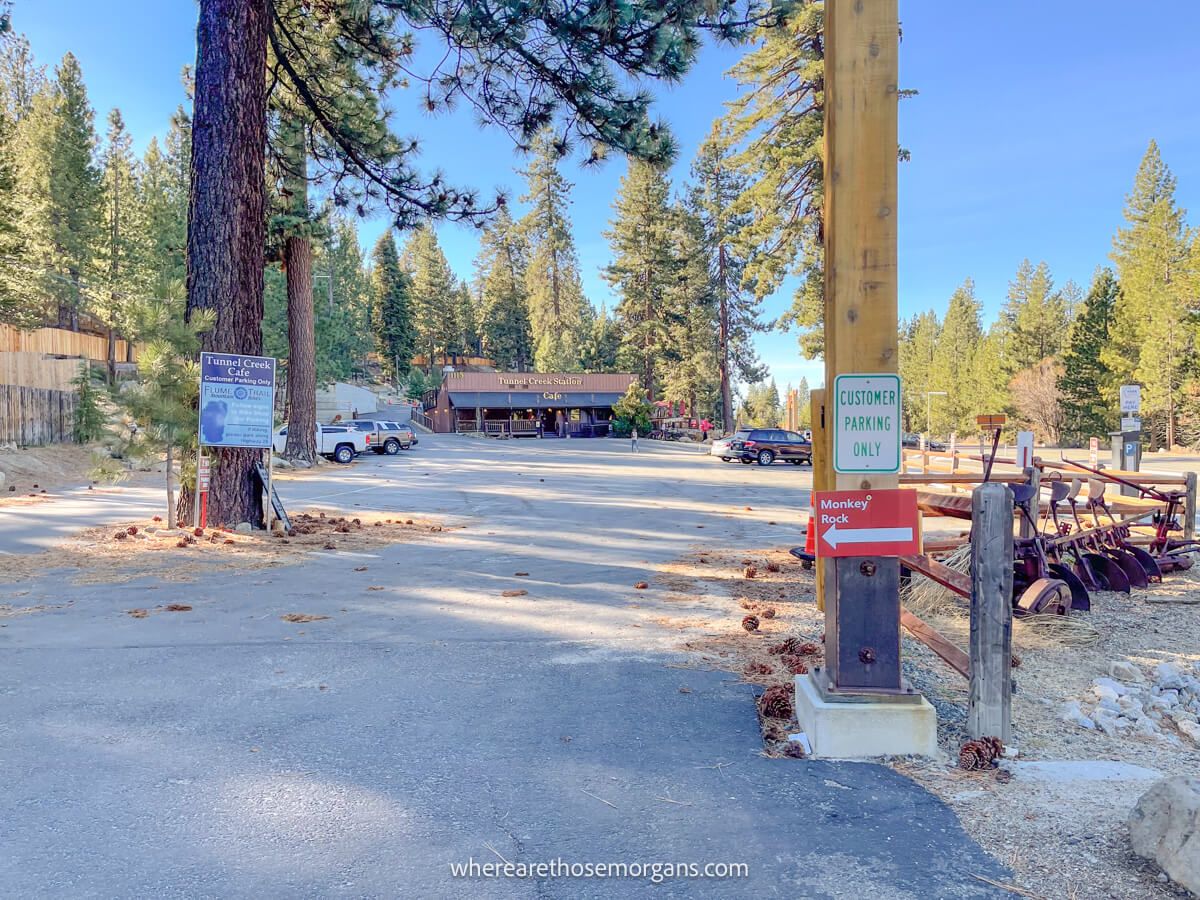 Signs with directions for a hike near Tunnel Creek buildings on highway 89 in Lake Tahoe on a sunny day