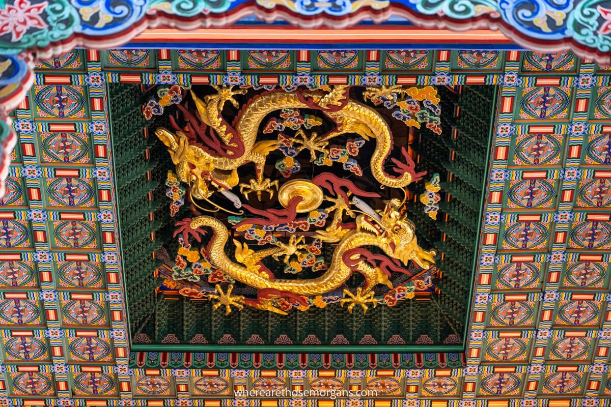 Two golden dragons on a ceiling in Gyeongbokgung Palace